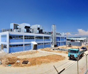 Μεταλλικό κτίριο επιφάνειας Ε=2.736,00 τ.μ. και διώροφο κτίριο γραφείων με 
επιφάνεια Ε=840,00 τ.μ.